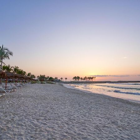 Salalah Rotana Resort Ngoại thất bức ảnh Sunset at the beach